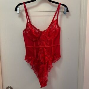 PrettyLittleThing Red Underwired Lace Bodysuit | Cage Detail Party Statement Top